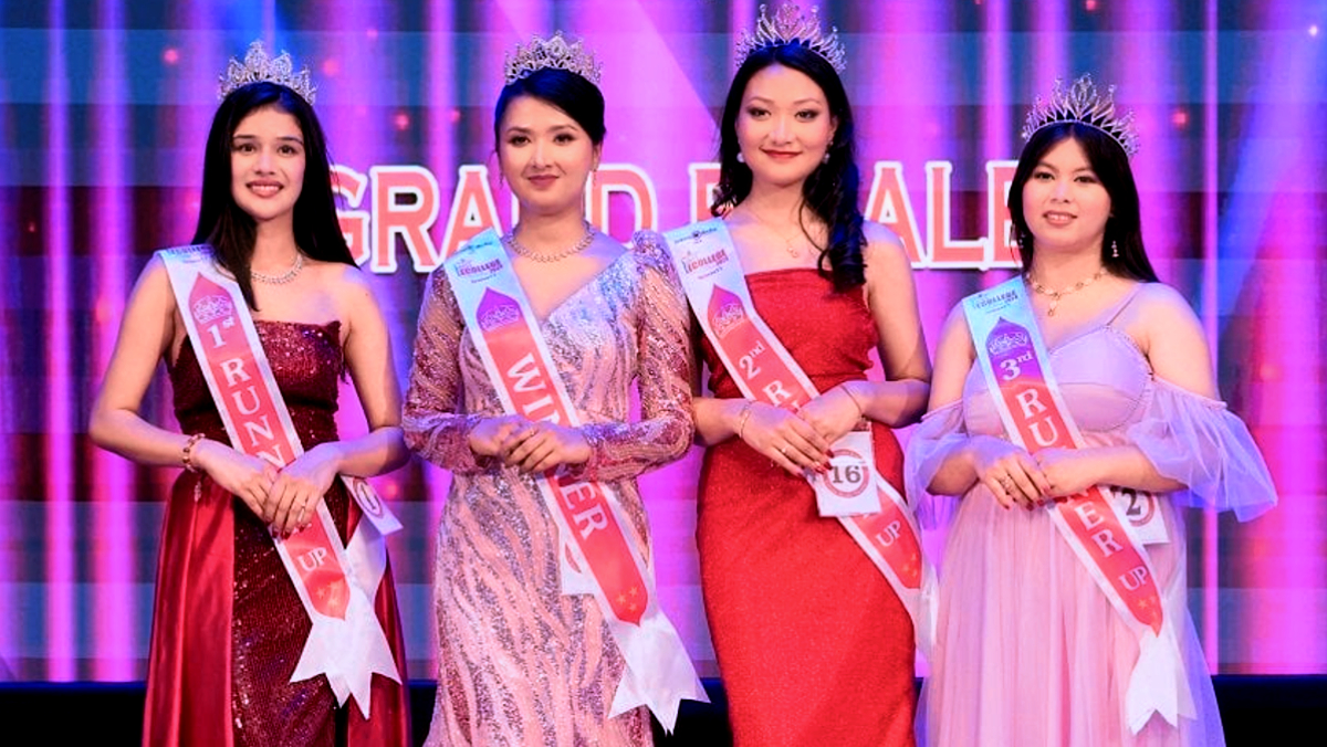 The crown of Miss Ecollege 2024 is on the head of Arju Paudel